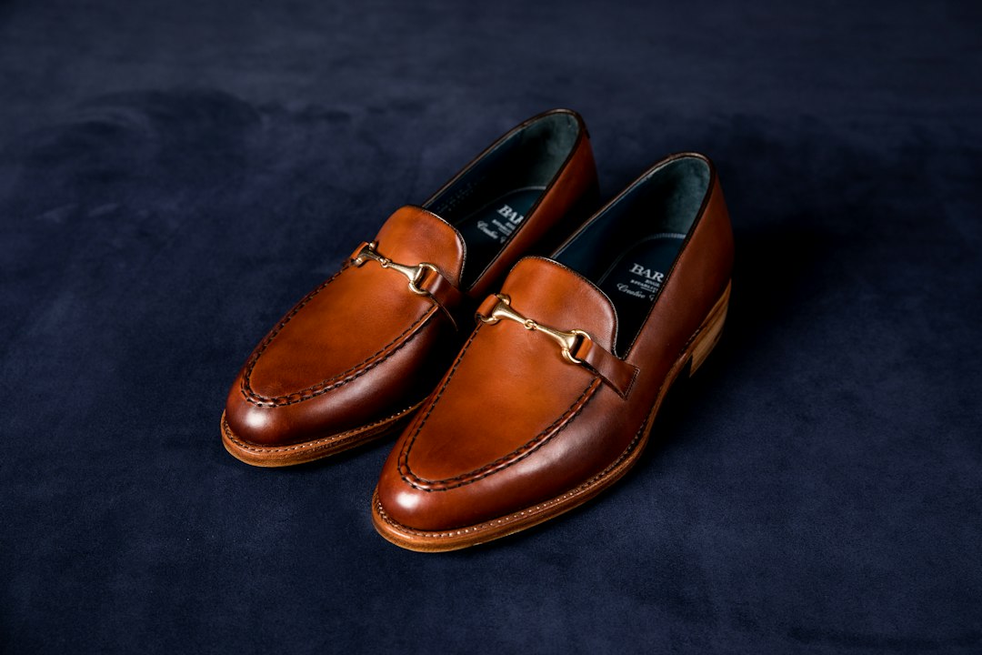 Brown leather bit loafers with metal hardware